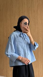 oval kesim bağcıklı gömlek mavi